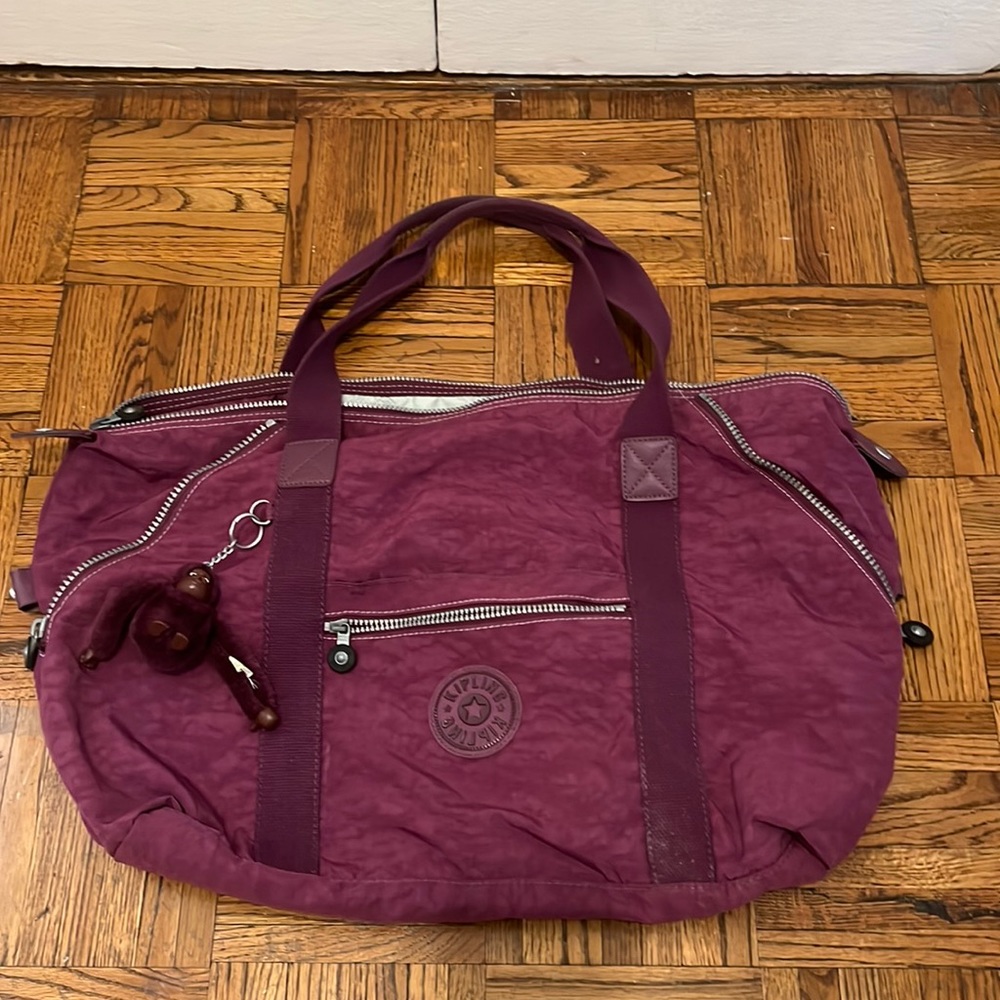 Purple Kipling duffel bag